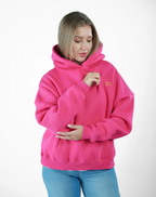 “Front logo, back inspiration — Ezi Fuchsia sweatshirt.”