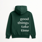“Front logo, back inspiration — Ezi green sweatshirt.”