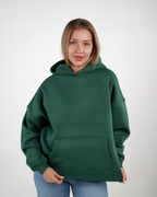 Green hoodie, bold back — ‘Bad Ideas, Good Story